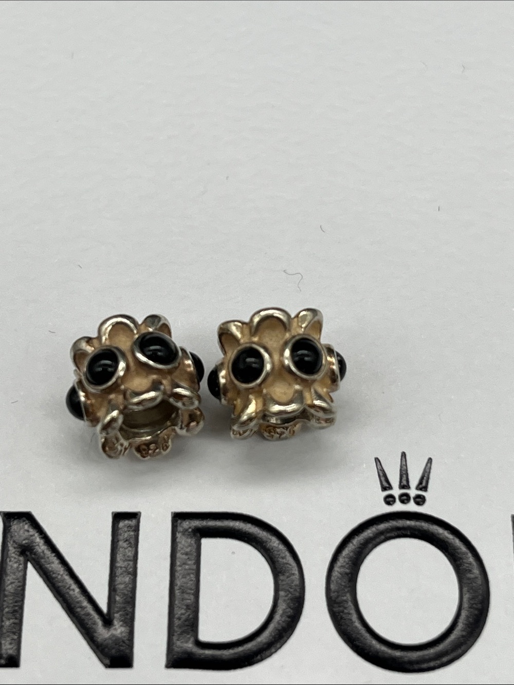 Set of two Pandora charms with black stone accents